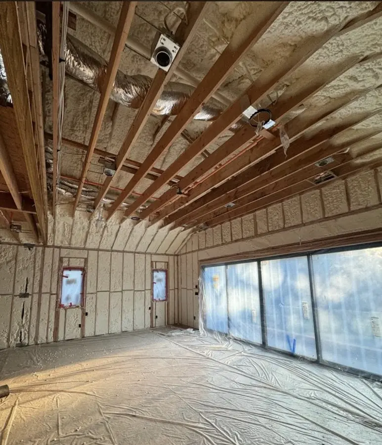 Interior walls and ceiling insulated with spray foam during new construction in Austintown